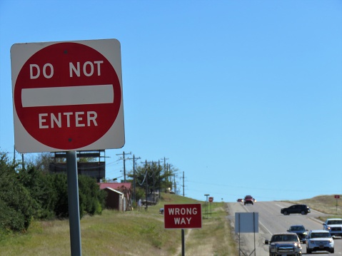 Wrong way sign on highway ramp